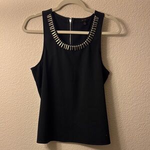 Black Sleeveless Top with Silver Accents